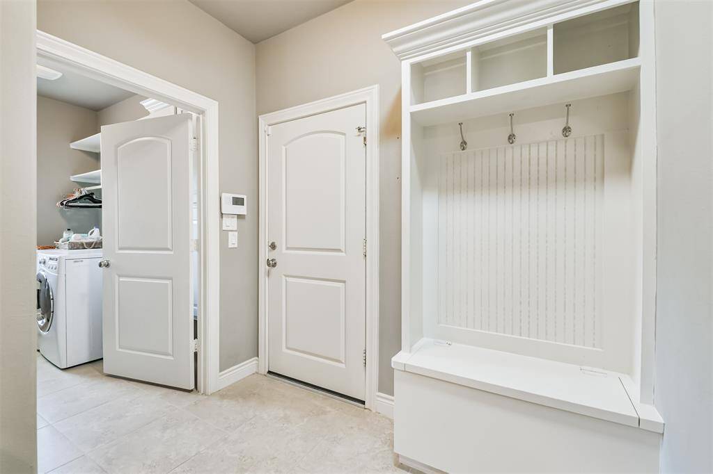 Drop zone and bench with storage coming in from garage and just off utility room so you can drop your dirty things.