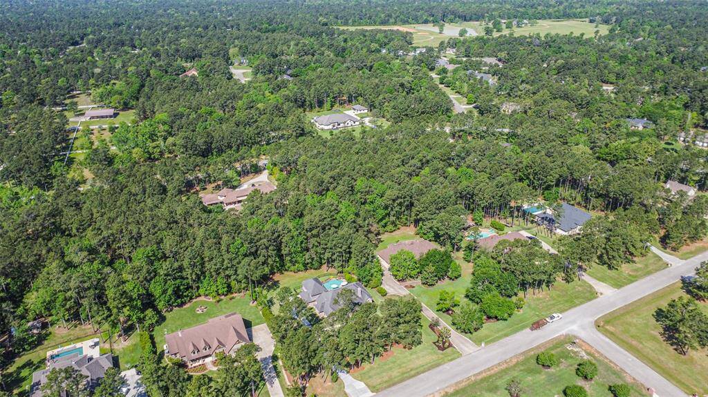 Take in the beauty of this established community surrounded by nature. With mature trees, winding roads, and large lots, the neighborhood offers a quiet retreat with all the charm of country living just minutes from town.