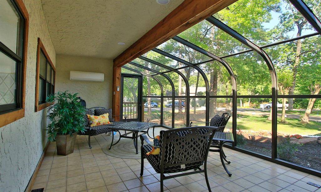 Enjoy your morning coffee in the Sunroom with heat and air conditioning for your comfort.