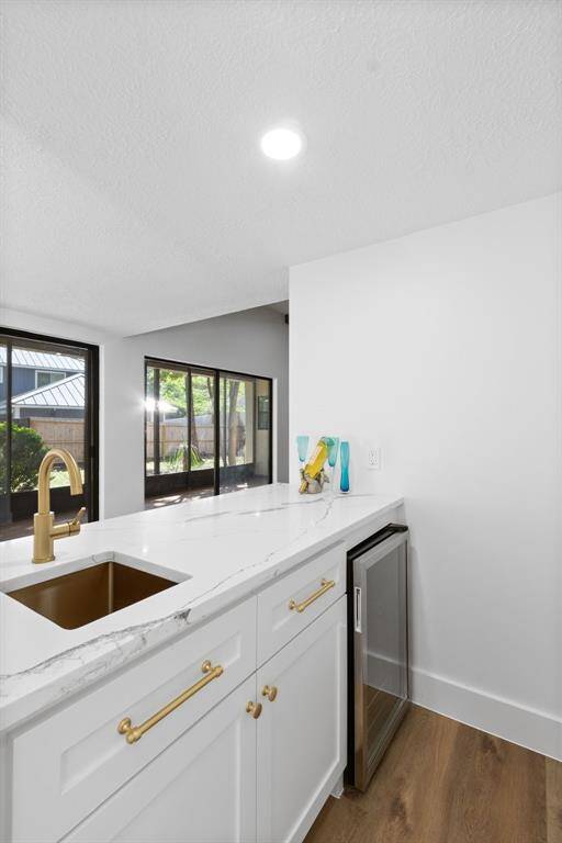 Wet Bar with a wine cooler.