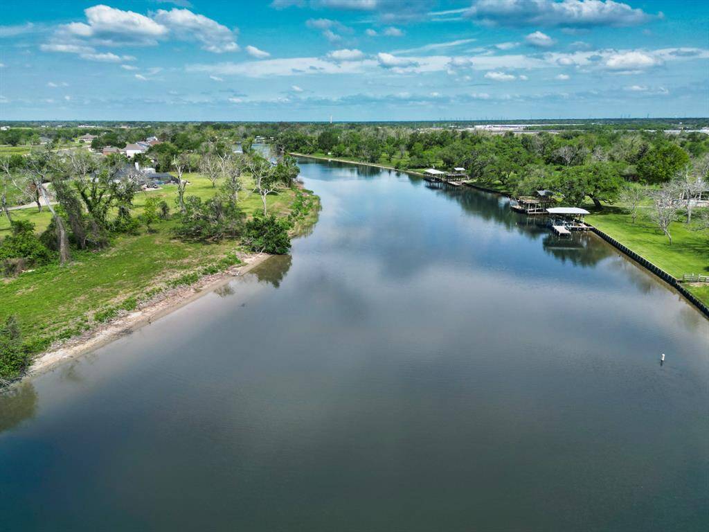 View North going up river towards the Sportsman Span Bridge on FM 521