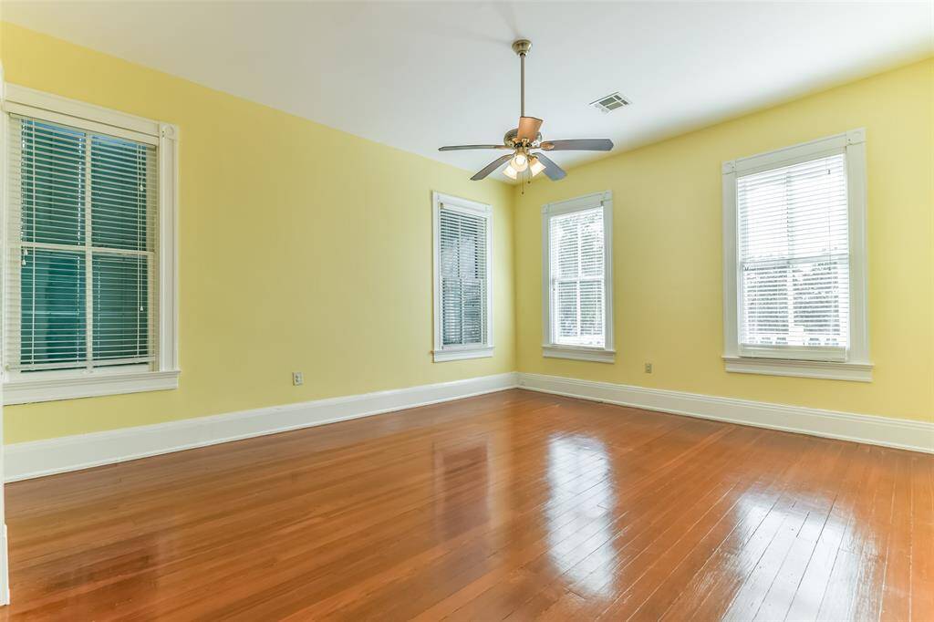 1st of 3 large bedrooms upstairs with original hardwoods.