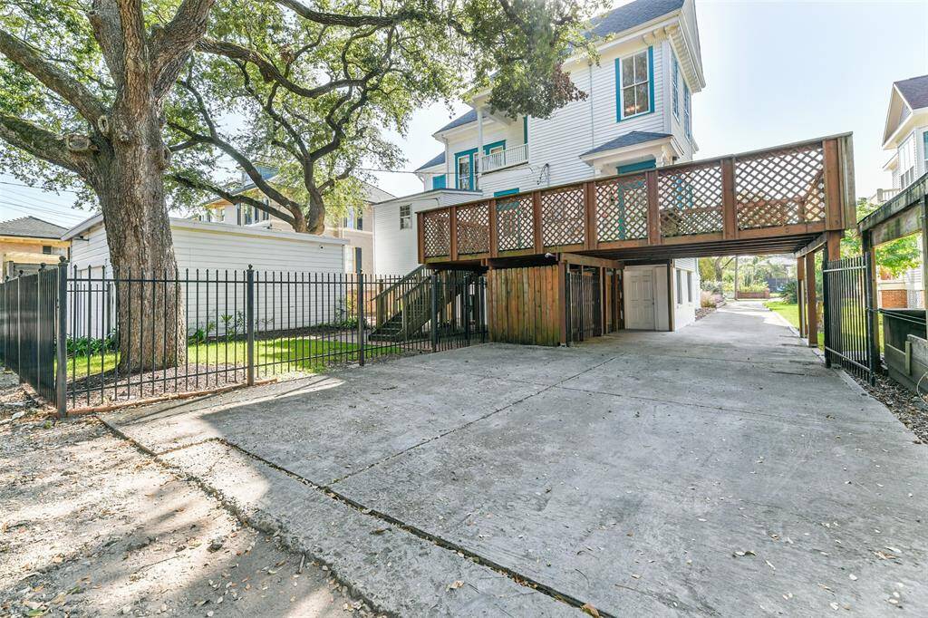 Large driveway just past the carport.