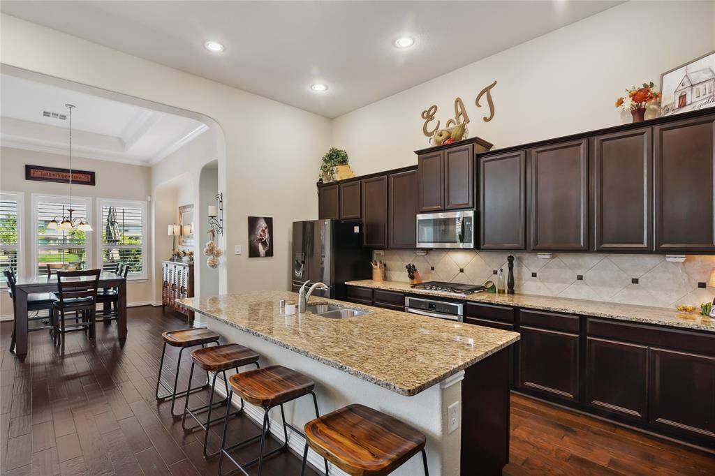 A Chefs Dream Kitchen with view of water.