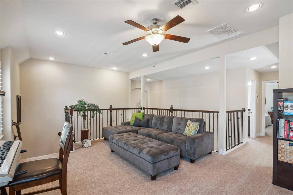 The second floor doesnt disappoint. Upstairs Living Area/Playrooom with upgraded lighting and digital thermostat for second HVAC unit.