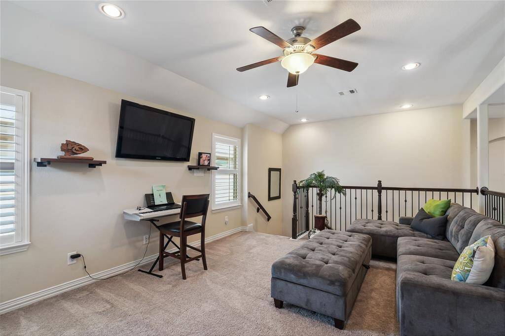 Upstairs Living Area/Playroom is great for entertaining.