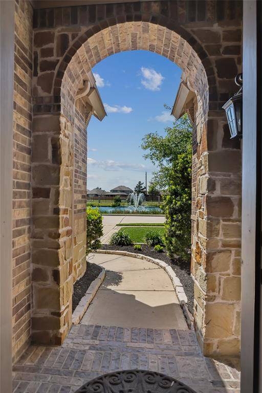 Front Entry View of Lake.  This home will wow you from front to back and inside.  Make an appointment today.