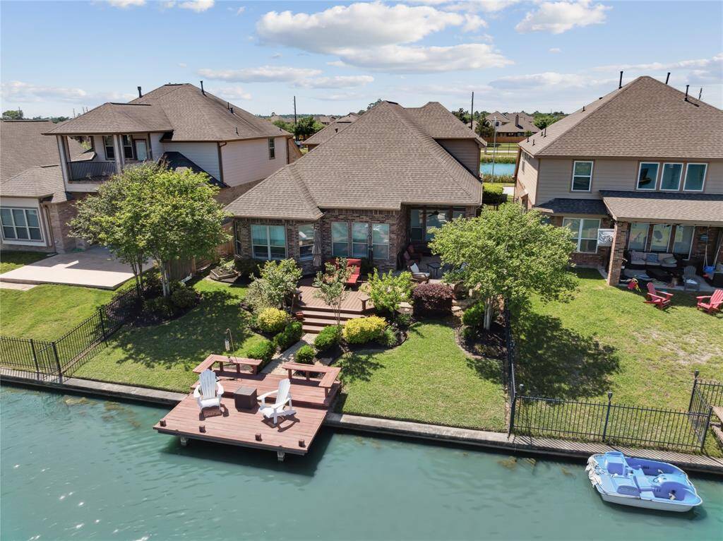 Aerial Shot of the custom designed Backyard made for entertaining and relaxing by the lake.