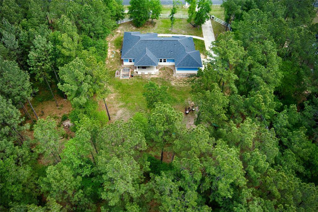 If you're a horse enthusiast, this 2 acre property has everything you need, plus an equestrian center.