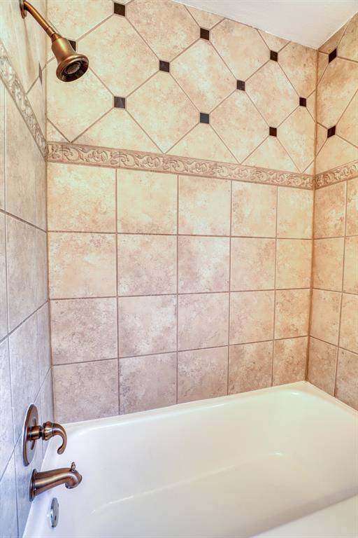Intricate Tile Work is Repeated in the Secondary Bathroom