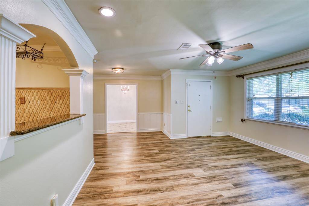 View of Living Area/Front Entry Door