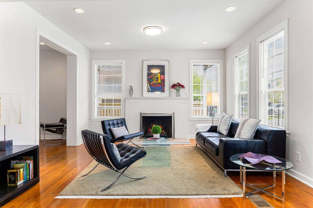 Unwind by the fireplace and enjoy cozy evenings in the spacious living room adjoined by the formal dining room.