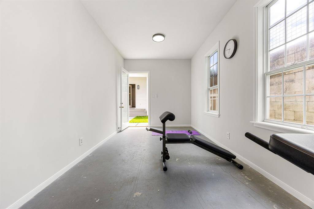 A flex space located at the front of the garage can be used as an office or gym.