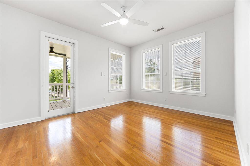 Upstairs bedrooms offer direct access to the expansive balcony—perfect for relaxing or entertaining.