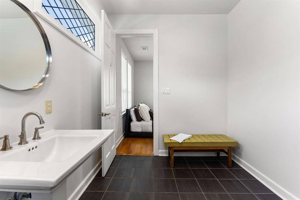 Step into luxury — the primary bathroom includes a spacious dressing area, perfect for your morning routine and evening unwind.