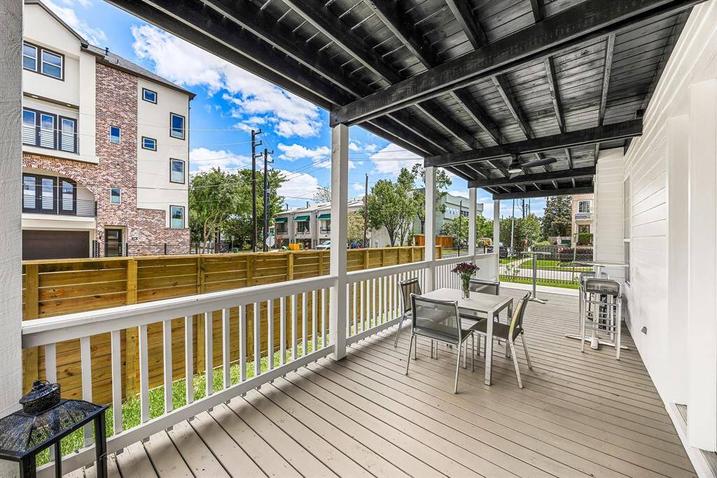 First floor covered outside porch with private fencing.