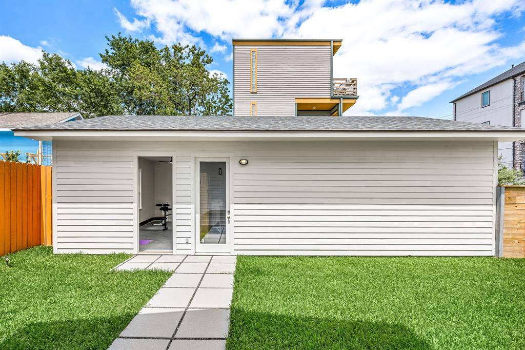 Detached 2 car garage with additional space being utilized as an exercise room currently.