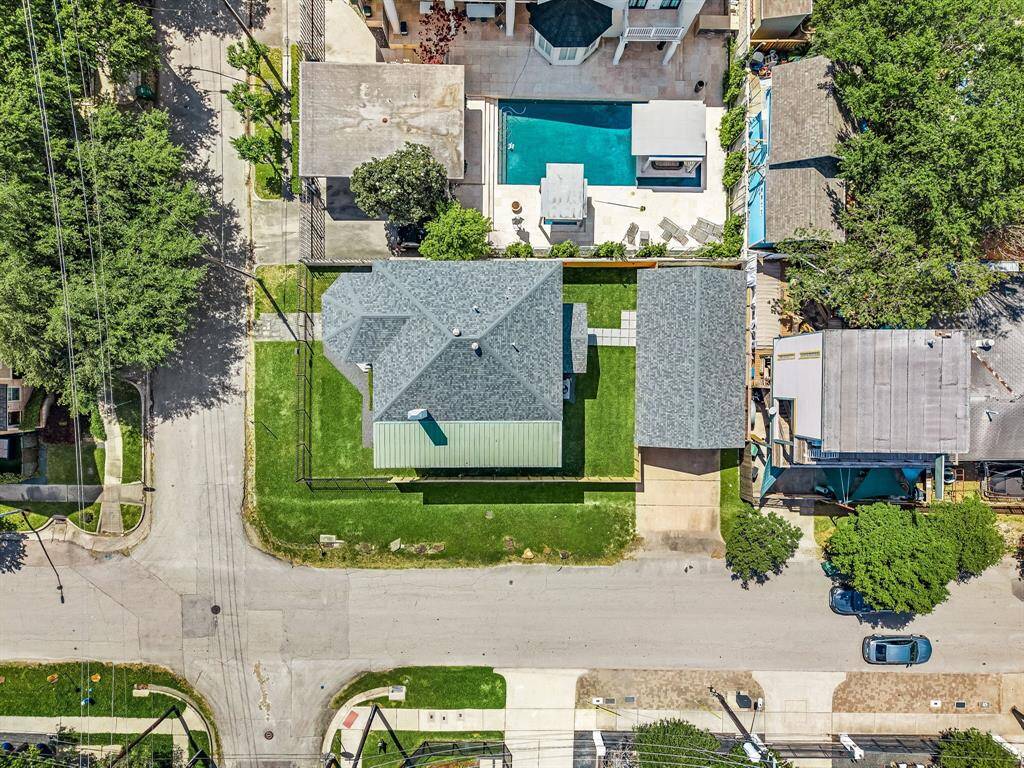 Aerial view of the home with oversized 2 car detached garage.