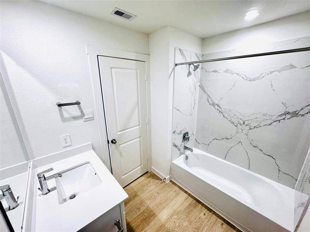 Elegant second full bathroom featuring modern fixtures and a stylish design.