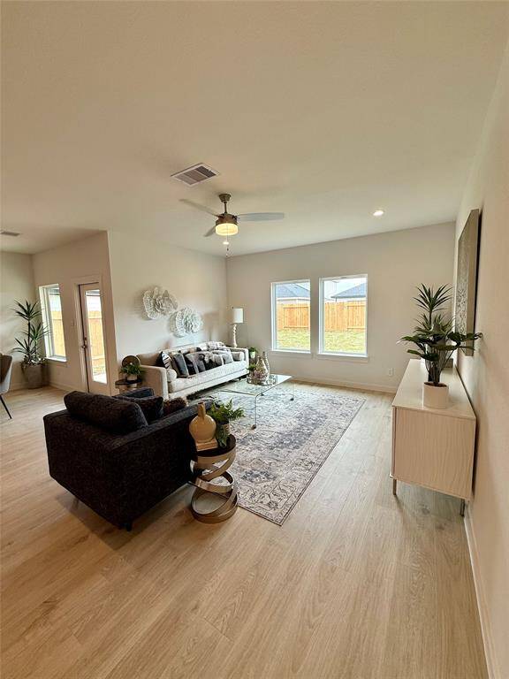 Luxurious master bathroom featuring elegant marble accents, a spacious glass-enclosed shower, a relaxing soaking tub, and a dual-sink vanity for ultimate comfort and style.