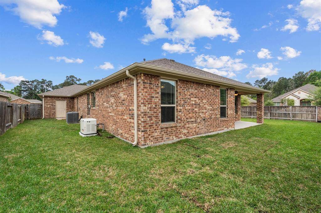 There's access to the back yard via the third bay of the garage which also creates a secondary side yard area.