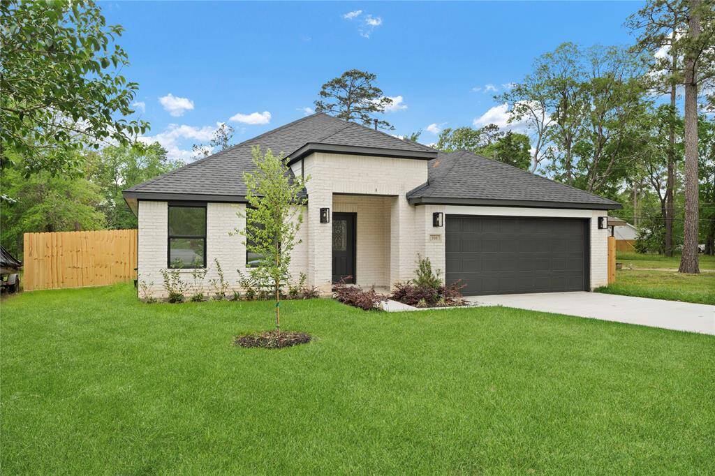 Clean lines and neutral brick tones give this home a stylish, modern edge.