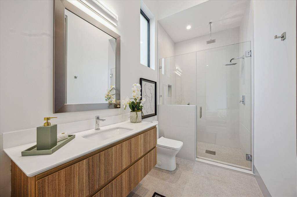 Downstairs guest bathroom with walk in closet