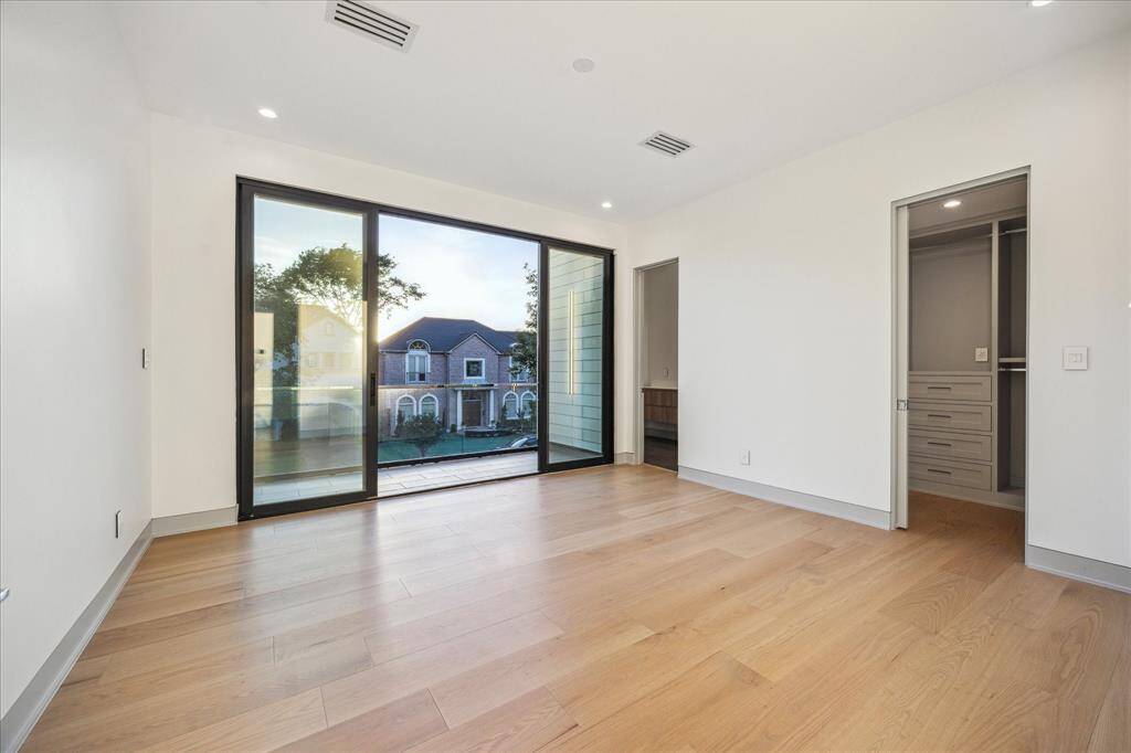 Bedroom #3 with sliding doors and private balcony