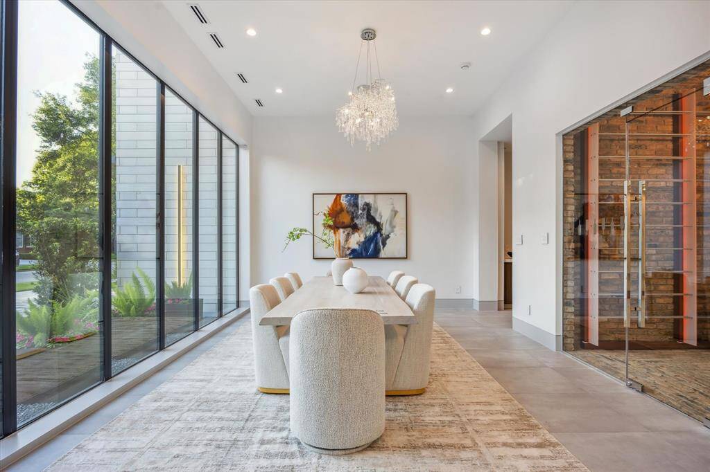 Dining room with views to front yard and access to wine room