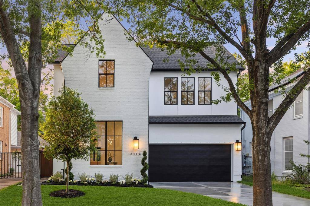 [FRONT ELEVATION] Striking curb appeal meets timeless design in this stunning new construction. The front elevation showcases a sophisticated blend of white brick and smooth stucco, creating a clean, modern aesthetic.