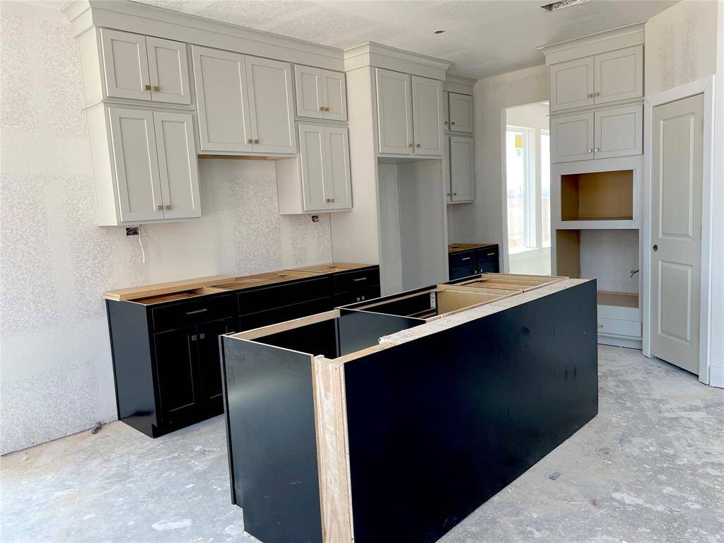 2 Tone Stacked Cabinets in the Must See Kitchen
