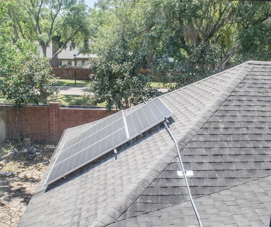 Under 10-year-old roof with over $48K in fully paid solar panels—eco-friendly and reduces energy bills by $200–$300 during summer