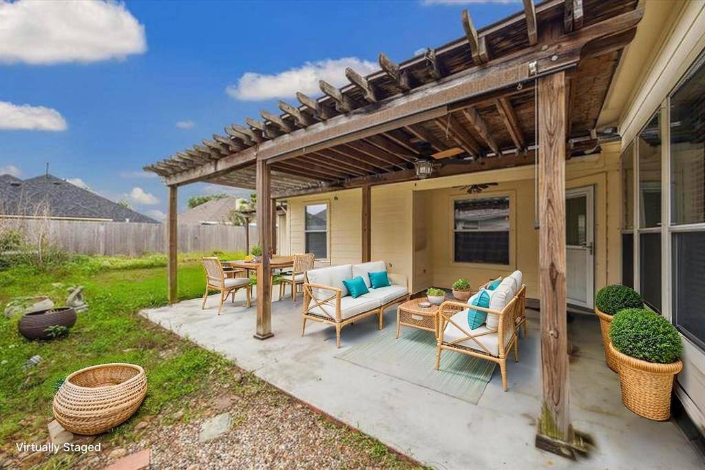 Large covered patio in backyard