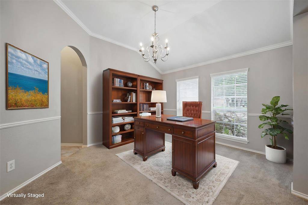 Dining room located off the entry as an office