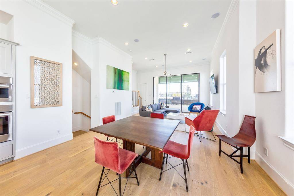 Kitchen opens to dining and living areas