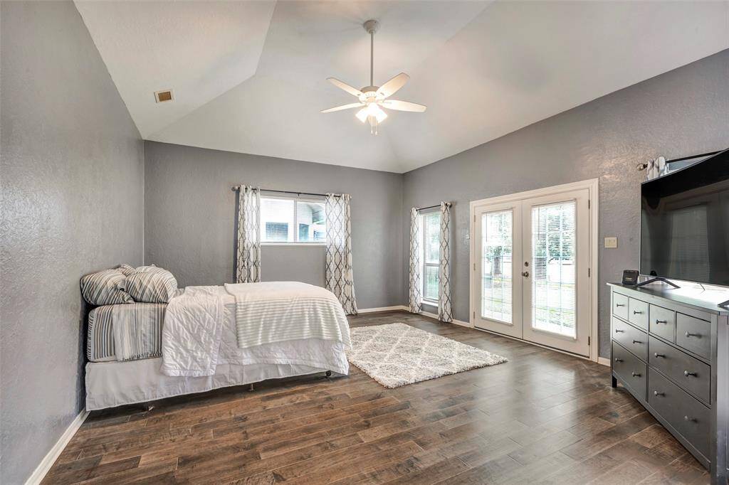 Oversized Primary suite- great views of the golf course and even a door with walkway to side patio.