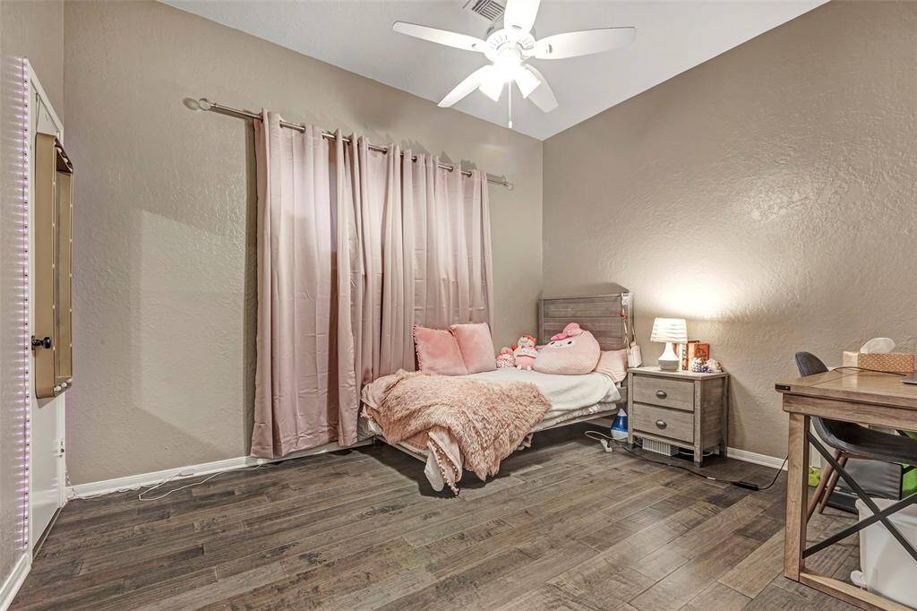 Secondary bedroom with walk in closet.