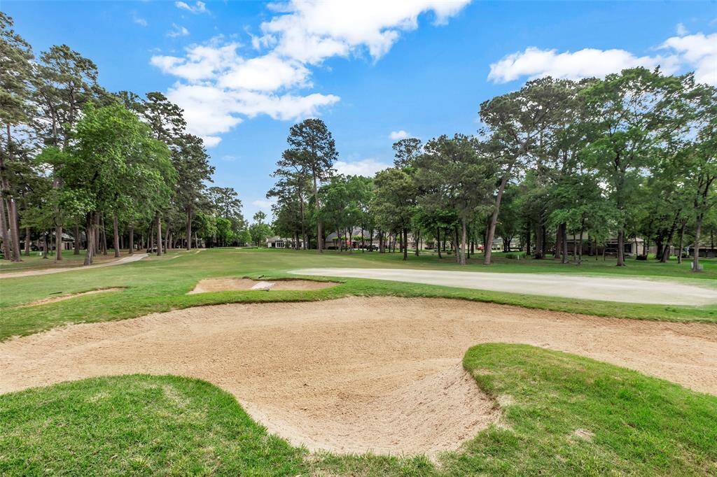 Sand trap near the flag looking back at tee box.
