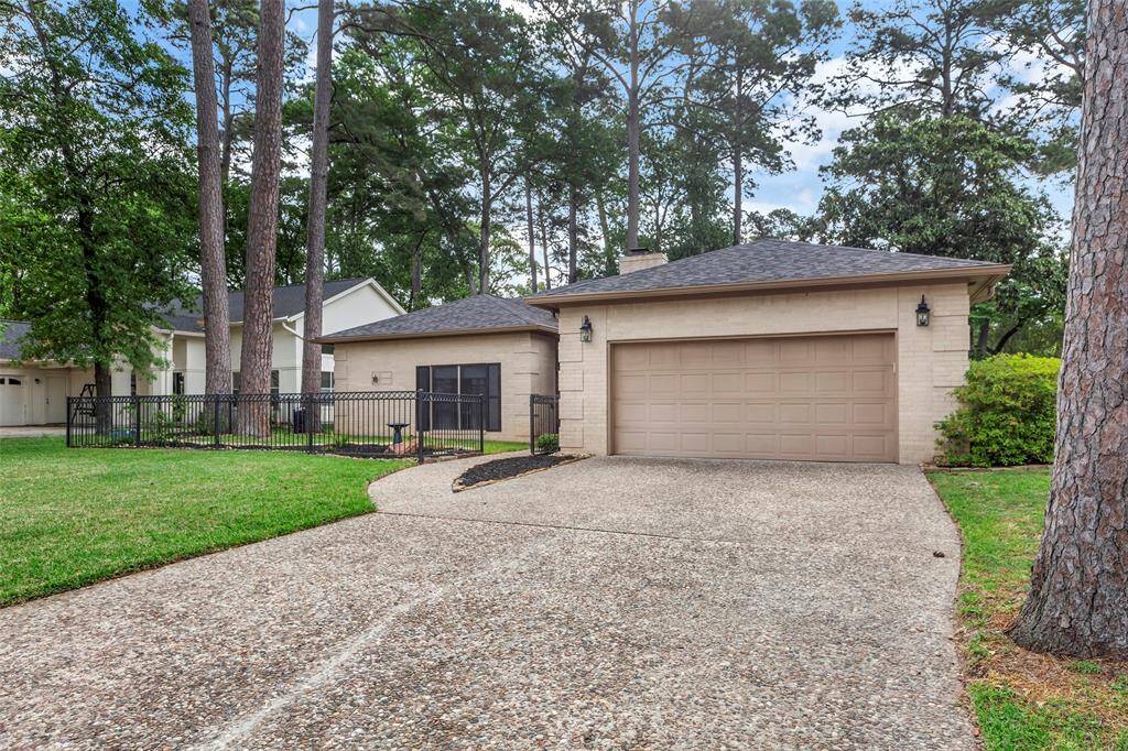 Metal fenced front yard space- perfect for your fur babies!
