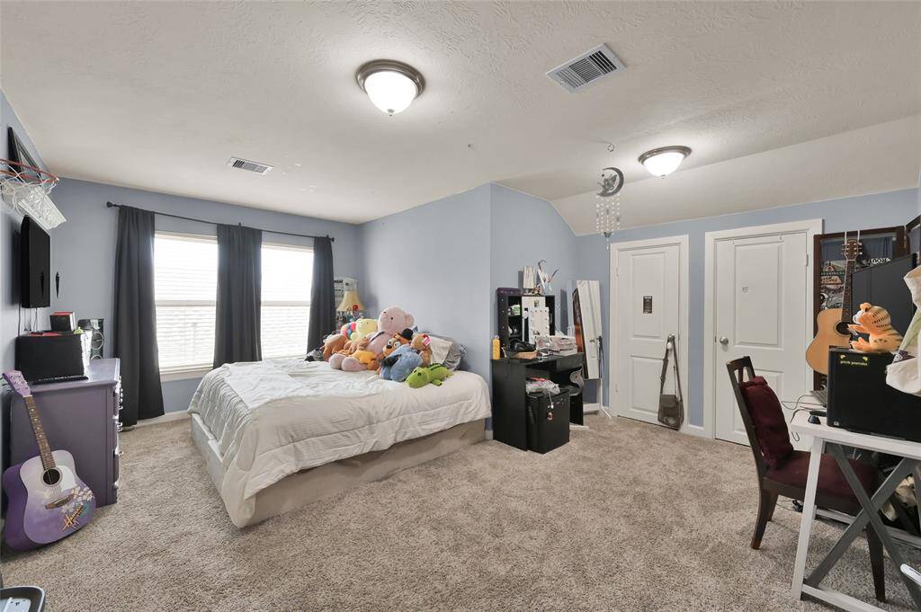 This is the largest of the secondary bedrooms with a large closet. Plenty of room for a desk as well.