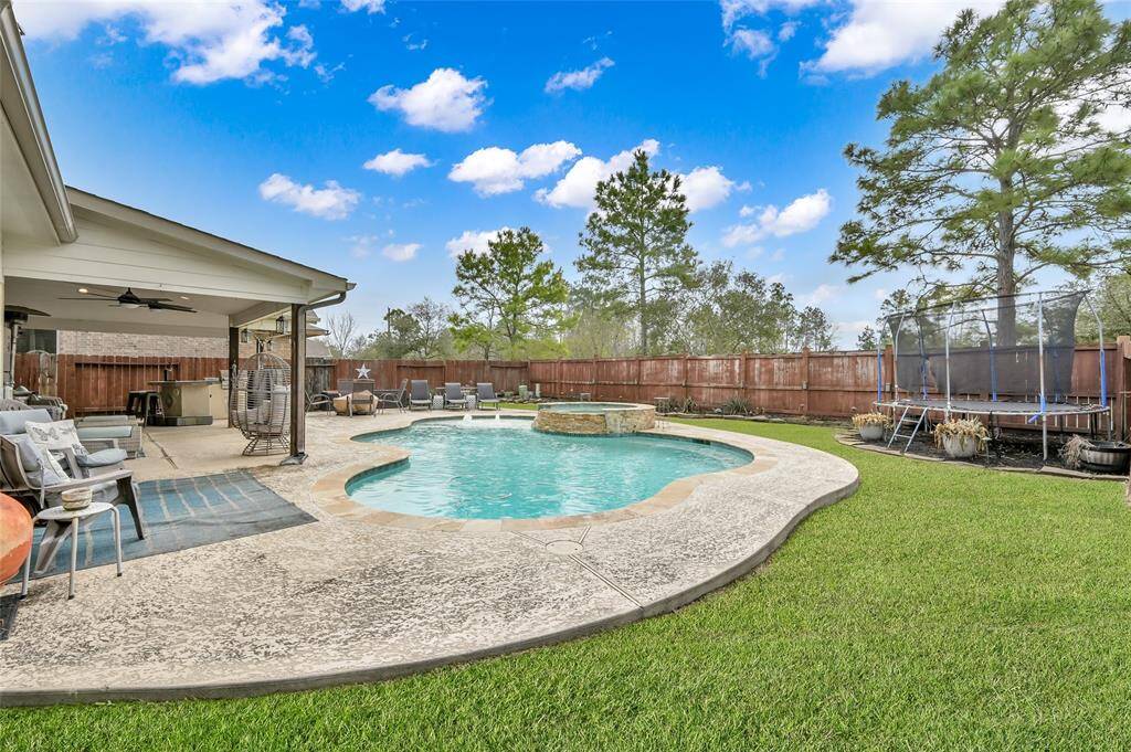 The backyard is large enough for a trampoline and plenty of grass for the pets.