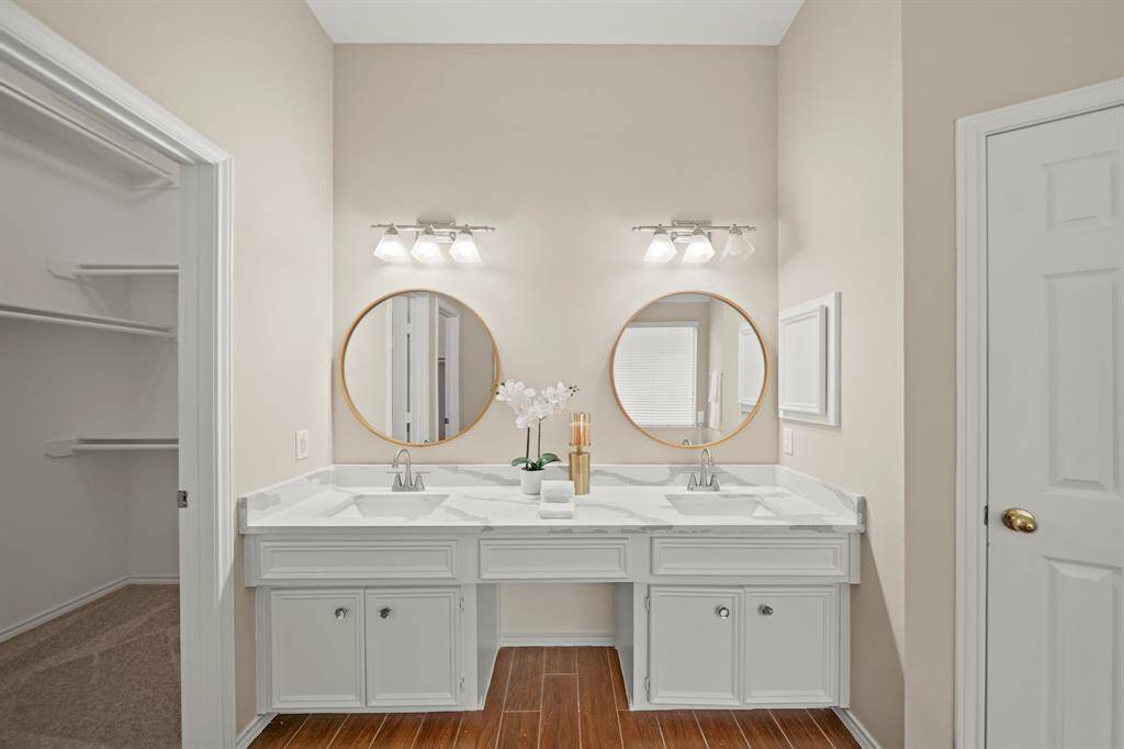 Double sinks, new counters, and freshly painted cabinets.