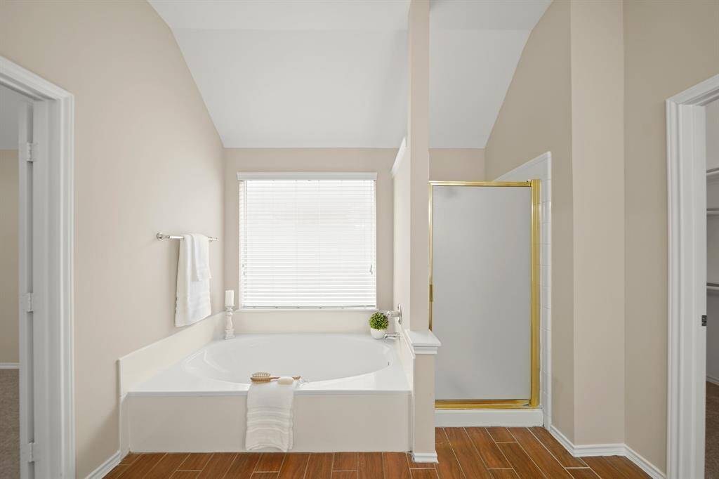 Large soaking tub for relaxing soaks or a good book.