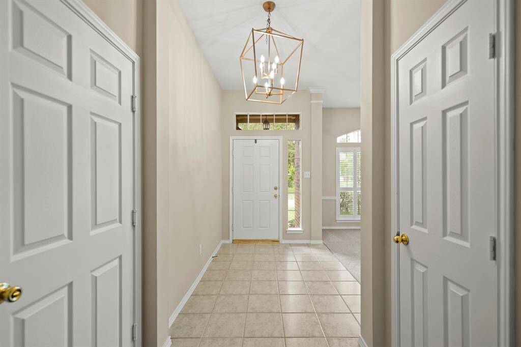 Step into a bright, inviting entry with stylish details and a warm welcome