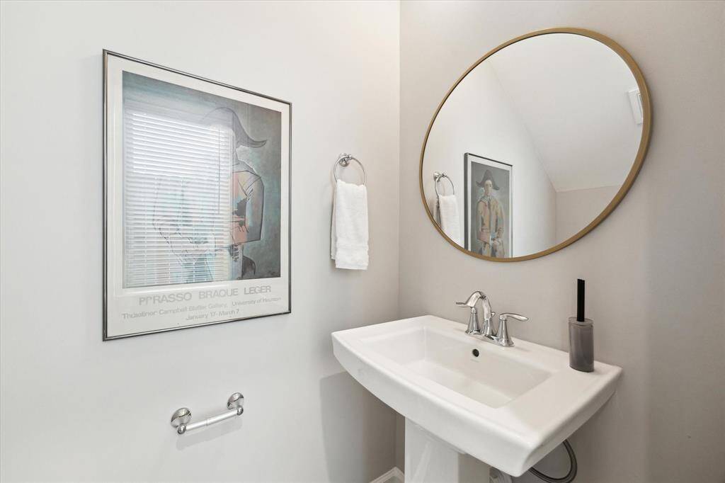 Powder room conveniently located off of the entry hall.