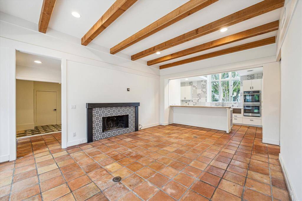 Family room off kitchen has backyard views