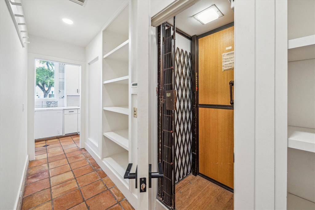 Elevator to second floor and attic storage