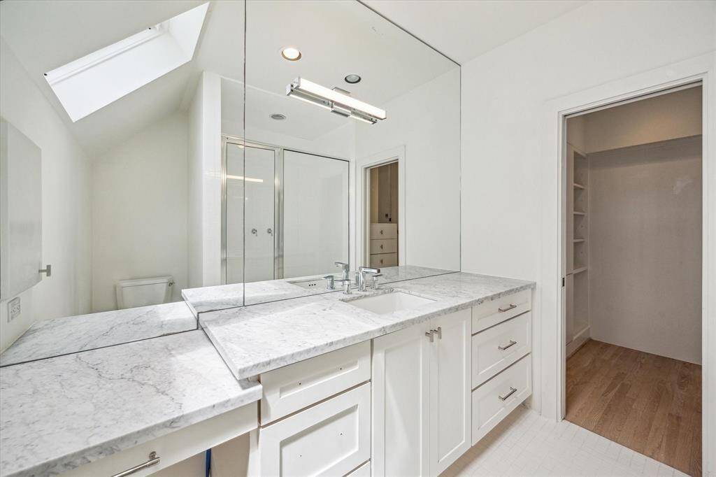 Updated secondary bath with vanity area
