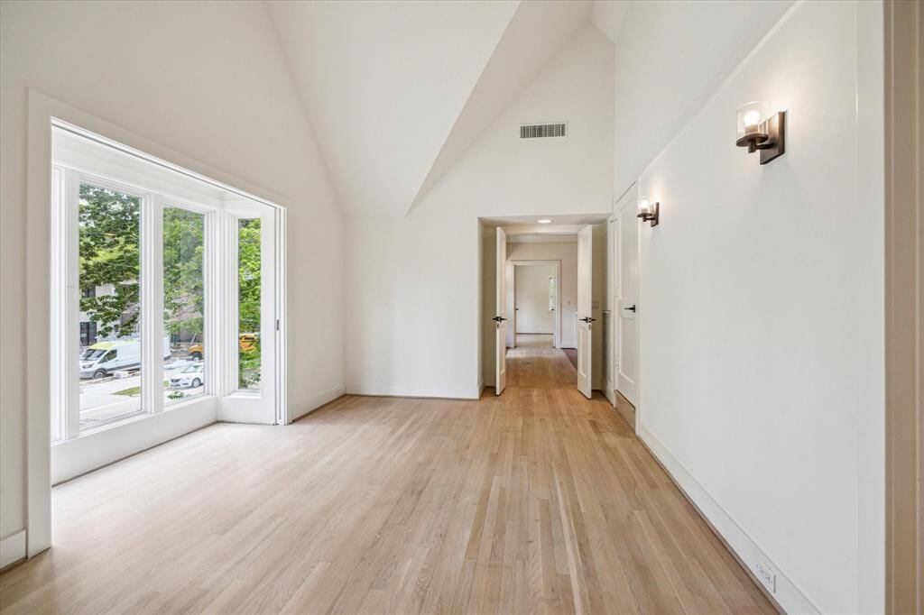 Gathering area between upstairs bedrooms with window nook