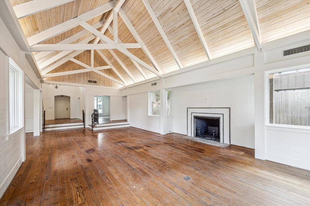 Great room has spectacular beamed ceiling